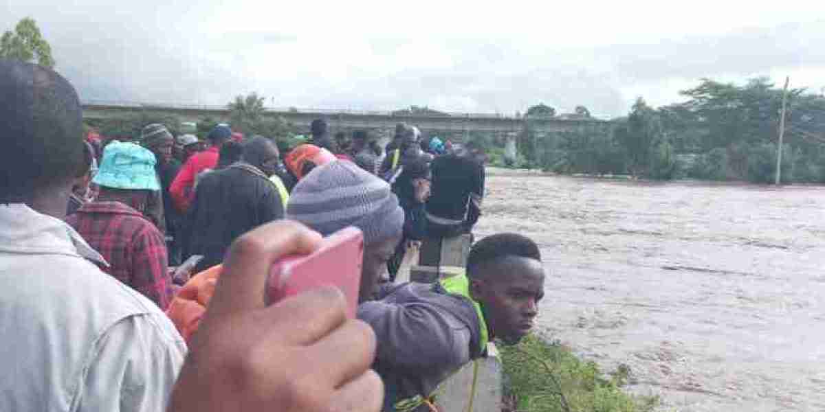 PHOTOS: Athi River bursts its banks paralysing transport, businesses.