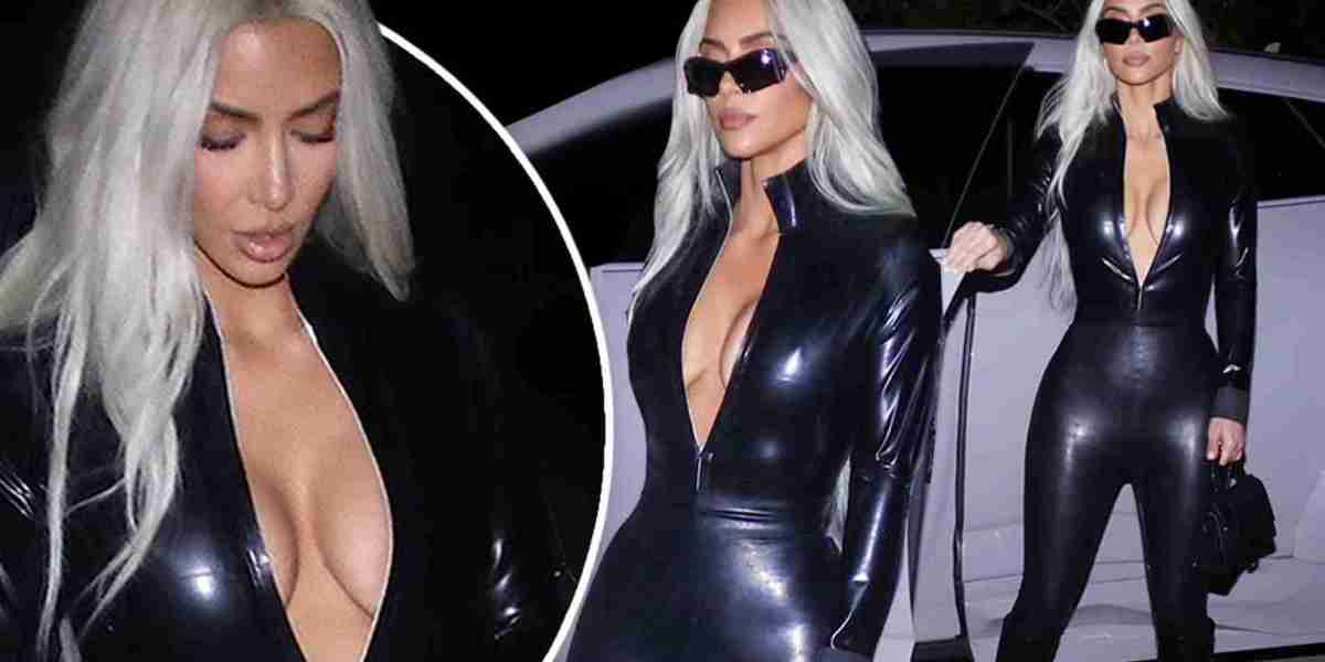 Kim Kardashian puts on a busty display in a plunging black leather catsuit that hugs her curves as she enjoys a night on