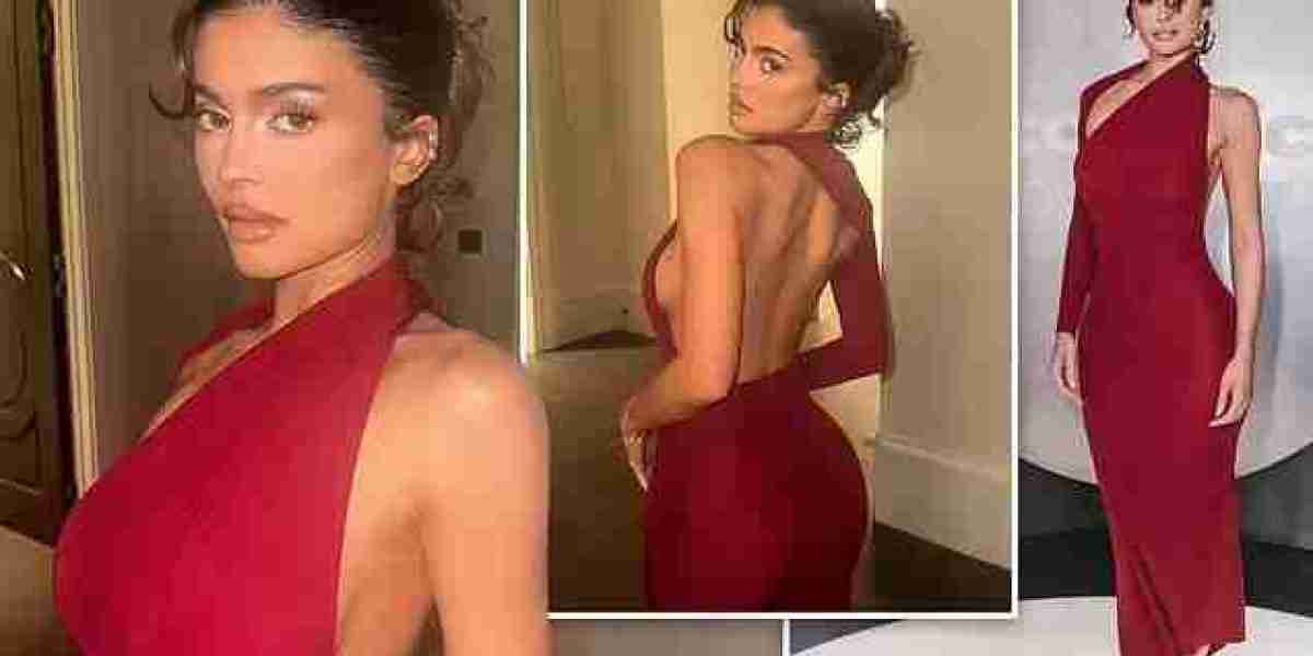 Kylie Jenner sizzles in a sexy backless red gown at the launch party for her debut fragrance Cosmic in LA.