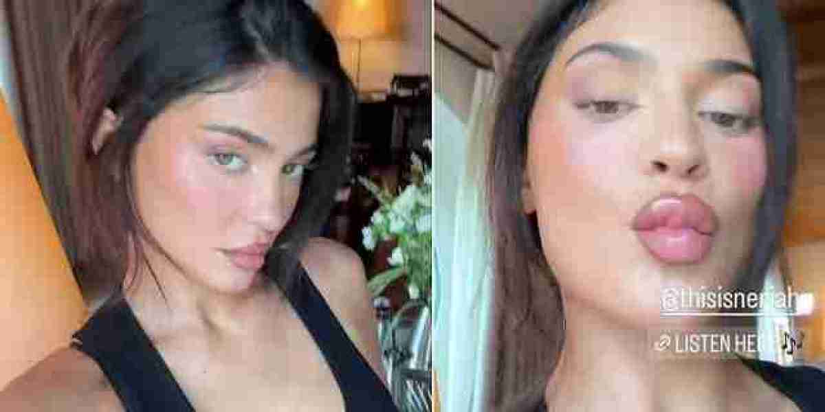 Kylie Jenner puts on a busty display in a skintight black tank top as she puckers up her lips in sultry video.
